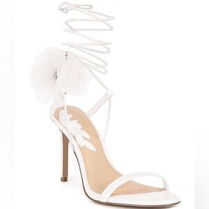 Strappy white high heels
